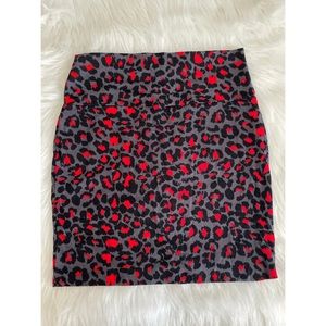 Charlotte Russe- Stretch Mini Skirt with Cheetah print Black, Grey, and Red.